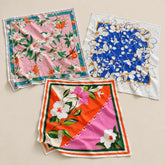 Elvara Bandana placed on a light beige surface