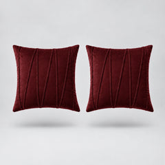 Embroidered V Velvet Cushion Cover Pack Of 2 floating on a light grey surface