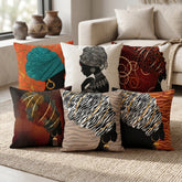 Six cushion covers with portraits of women wearing colourful patterned headwraps.