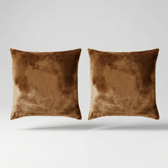 Vintage Velvet Cushion Covers floating on a light grey surface