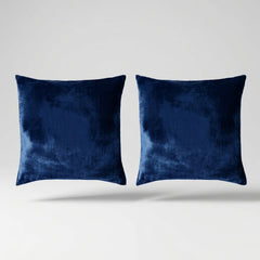Vintage Velvet Cushion Covers floating on a light grey surface