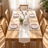 Ivory table runner with subtle texture and matching placemats.