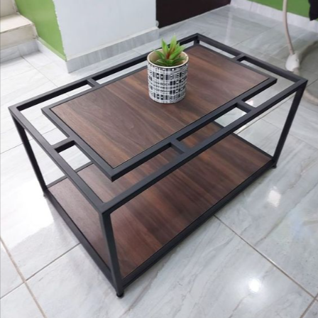 Brown rectangular coffee table with black open frame and lower shelf