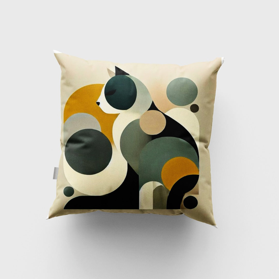 Cream cushion cover with an abstract curled cat formed from green and mustard circles.