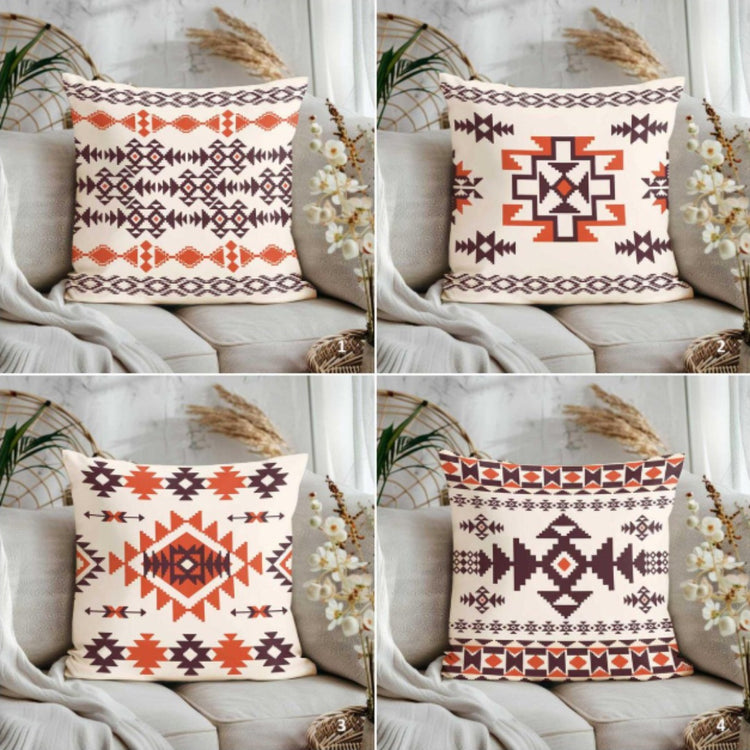 Four cream cushion covers with rust and dark brown geometric patterns.