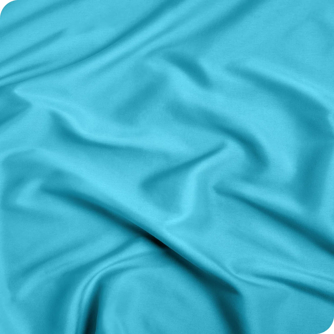 Close-up of peacock blue fitted-sheet fabric.