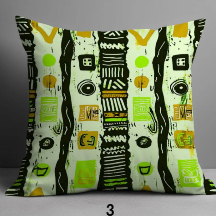 Cushion cover with green, black and cream vertical bands of abstract motifs.