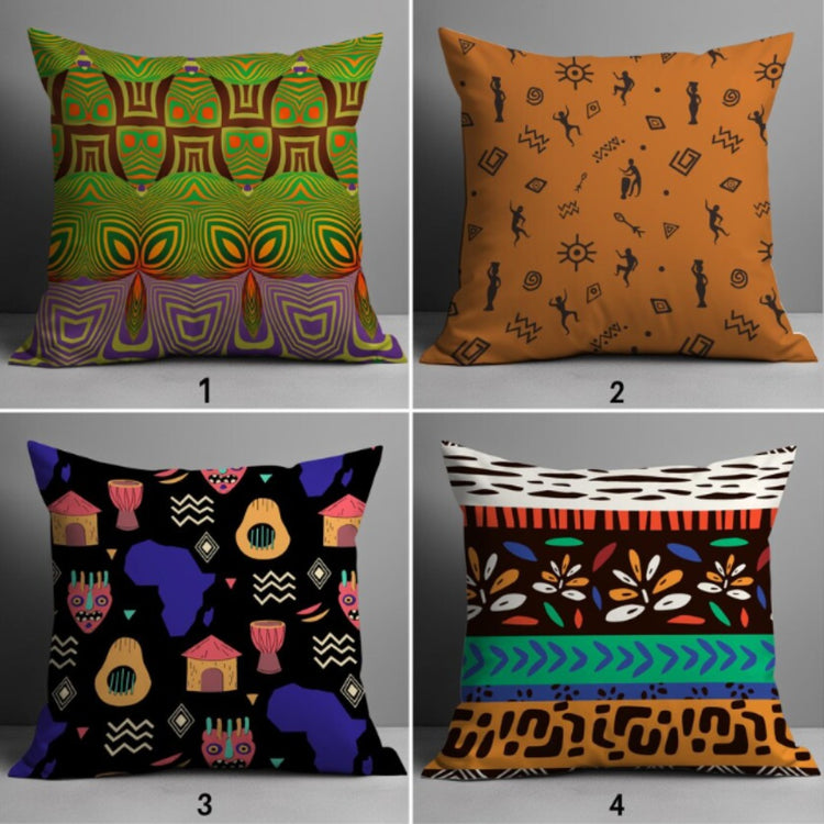 Four cushion covers with green, orange, black and multicoloured symbolic patterns.