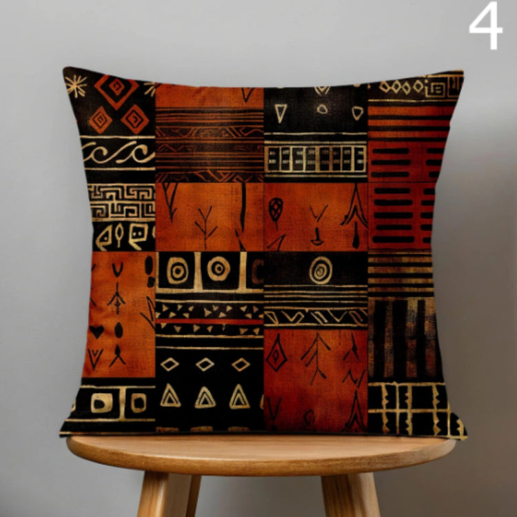 Cushion cover with rust, brown, mustard and black geometric patchwork panels.