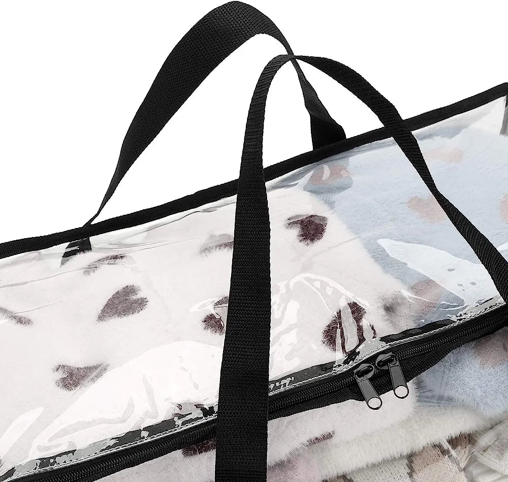 Close-up of the handles on a clear clothing-storage bag.