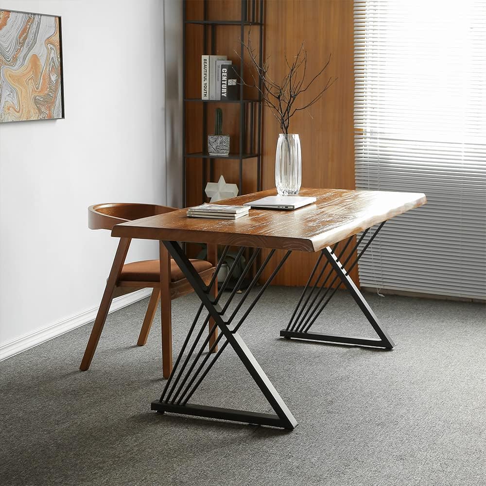Brown-top desk with black crossed leg supports and narrow diagonal rods beside a wooden chair.