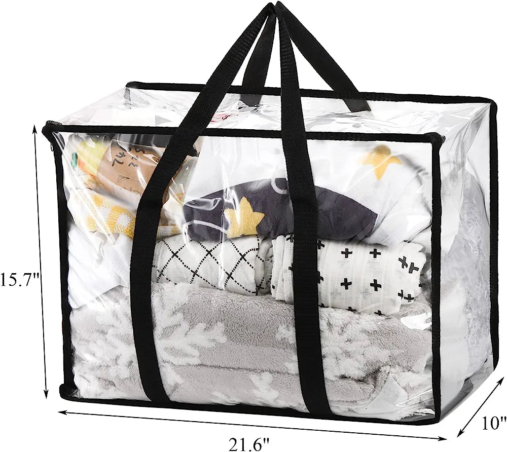 Clear bedding-storage bag with black handles and dimension markings.