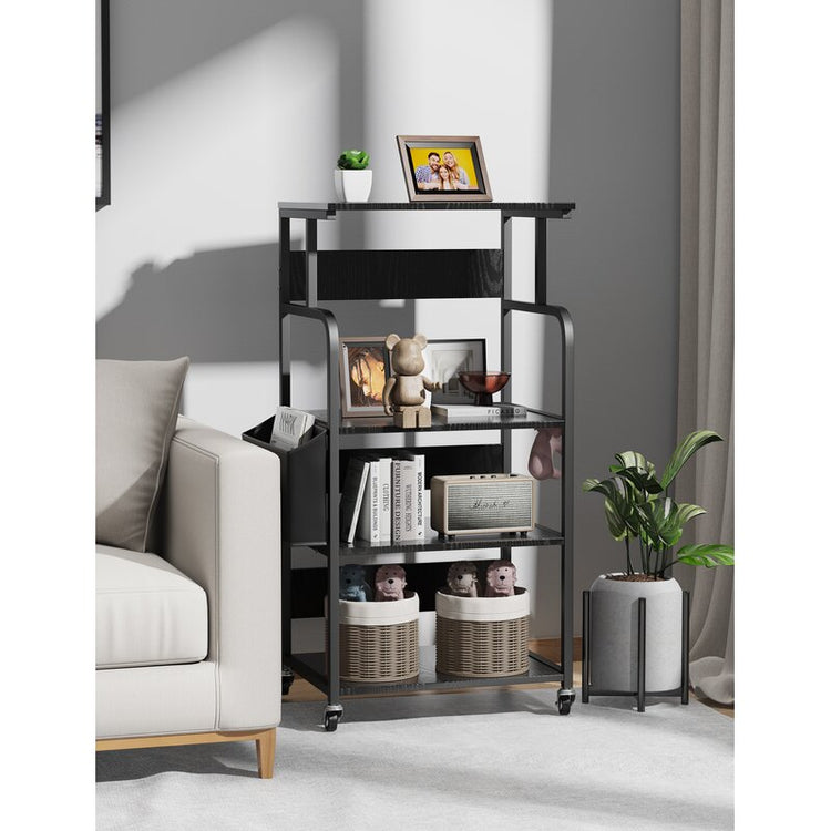Black shelving cart with rounded side rails displaying books and decorative objects