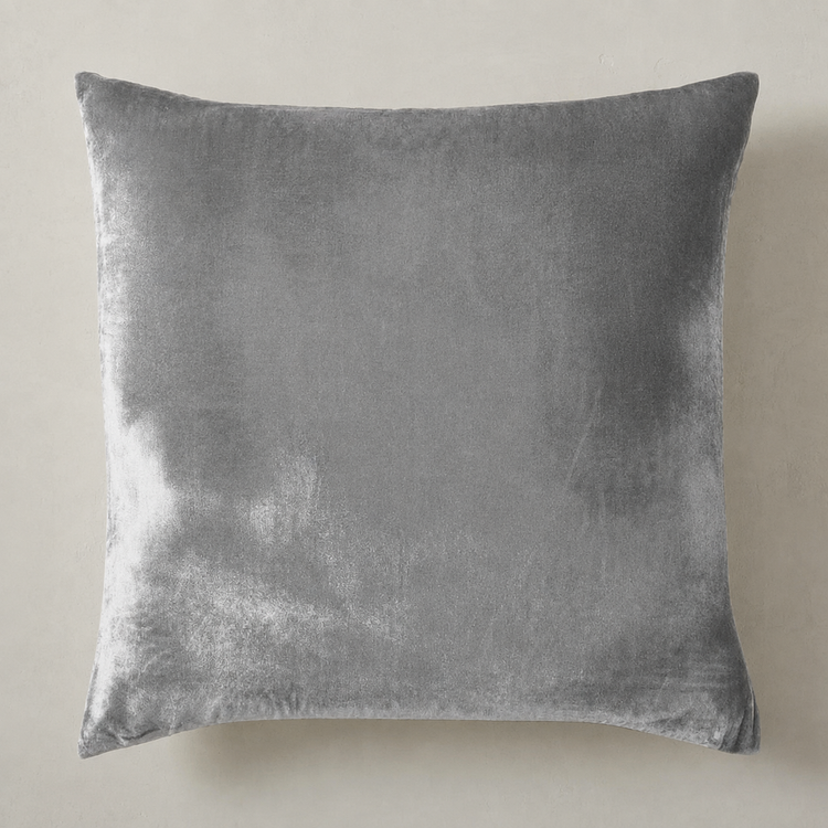 Plain grey filled cushion with a soft textured finish.