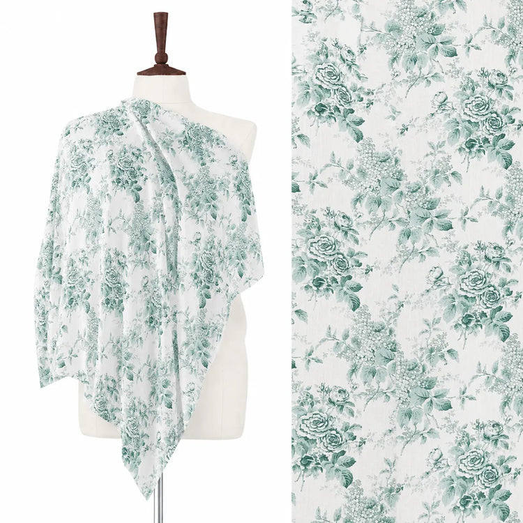 White stole with pale green floral branches, shown on a mannequin with a close-up.