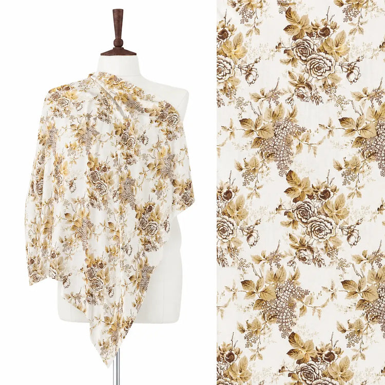 White stole with gold and brown floral branches, shown on a mannequin with a close-up.