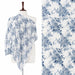 White stole with blue floral branches, shown on a mannequin with a fabric close-up.