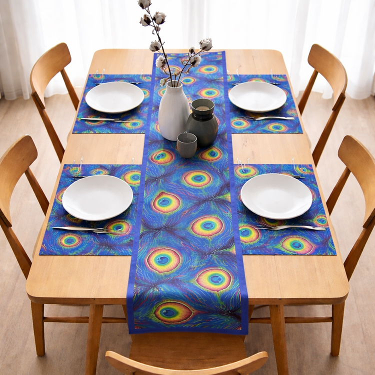 Blue table runner with green and yellow circular motifs and matching placemats.