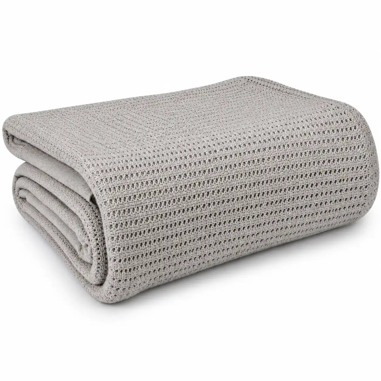 A folded light gray knit blanket 