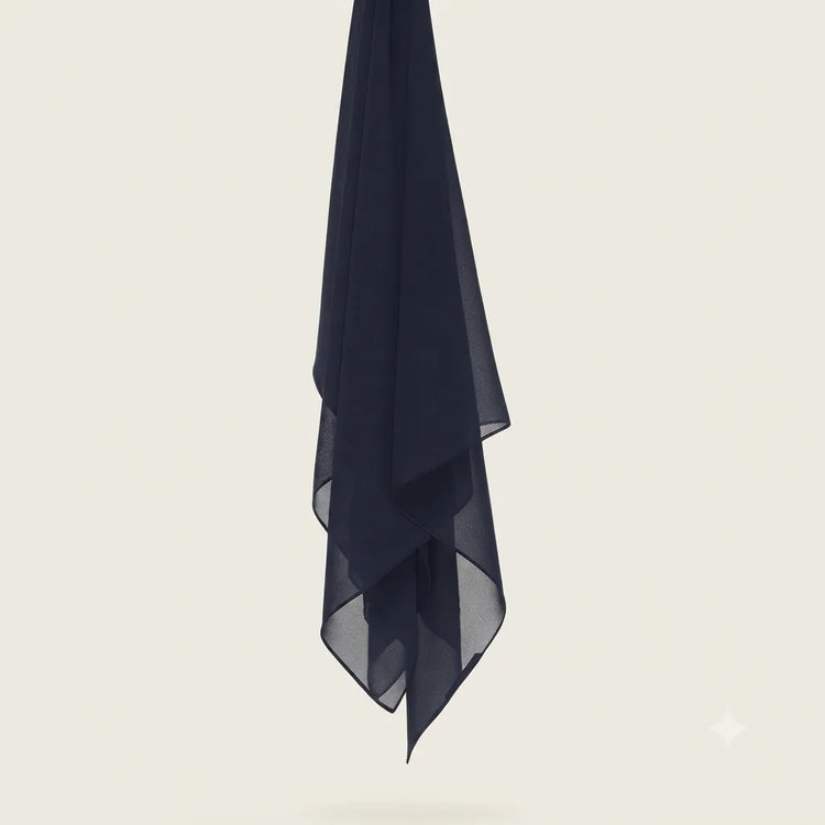 Navy chiffon stole hanging vertically to show its light fabric.