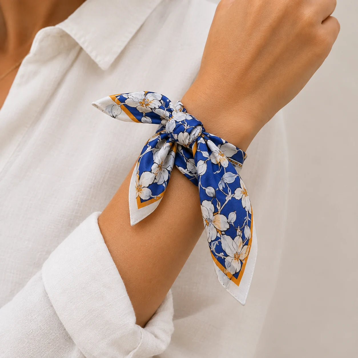 Elvara Bandana Set tied around a wrist in a close shot