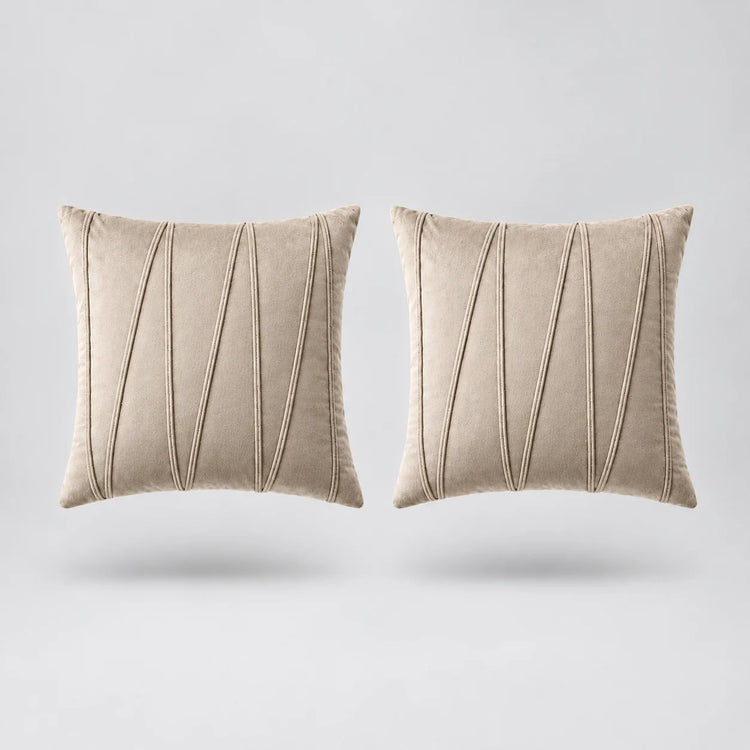 Embroidered V Velvet Cushion Cover Pack Of 2 floating on a light grey surface