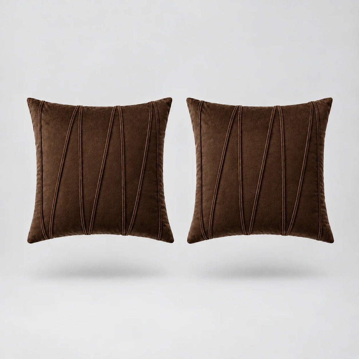 Embroidered V Velvet Cushion Cover Pack Of 2 floating on a light grey surface