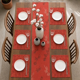 Terracotta botanical table runner with matching placemats.