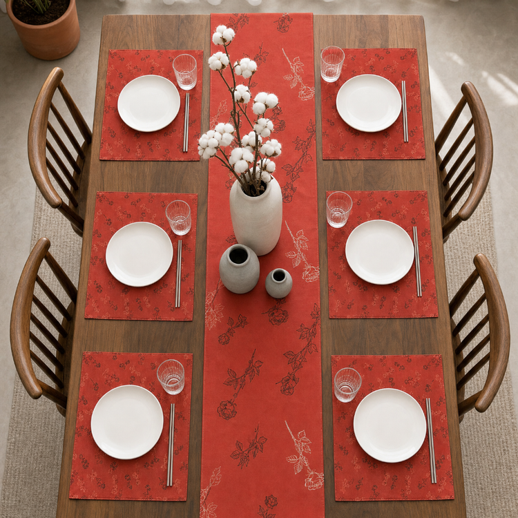 Terracotta botanical table runner with matching placemats.