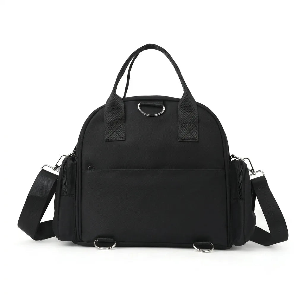 Rear view of a black bag with carry handles and side shoulder strap