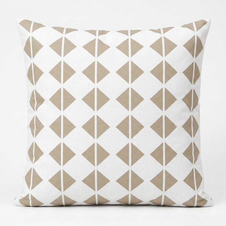 White cushion cover with rows of small beige geometric diamonds.