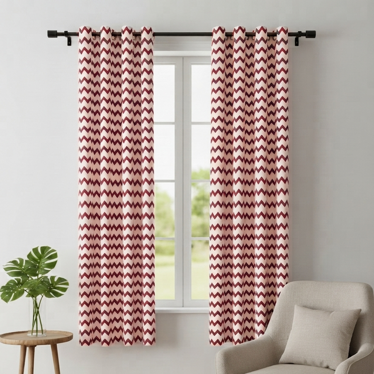 Burgundy and white chevron curtains framing a window.