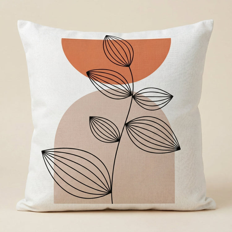 Cream cushion cover with a fine black leafy stem over rust and beige rounded shapes.