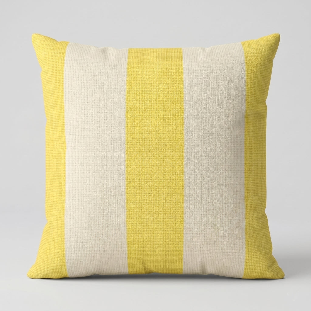 Cushion cover with broad pale yellow and cream vertical stripes.