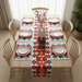 Bright geometric diamond table runner with matching placemats on a dining table.