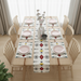 Cream geometric table runner with black, red and yellow motifs and matching placemats.
