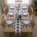 Cream table runner with navy and red geometric diamonds and matching placemats.