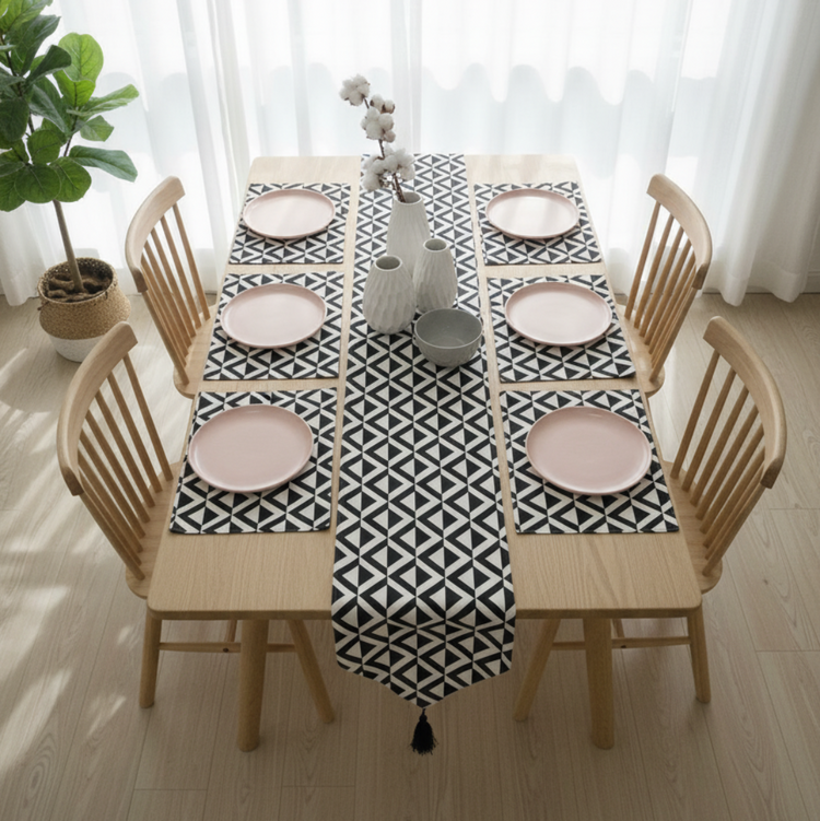 Black and white small-triangle mosaic table runner with matching placemats.
