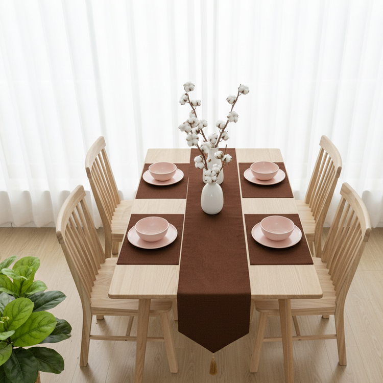 Plain brown velvet table runner with matching brown placemats.
