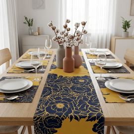 Navy and gold floral table runner with matching placemats.