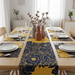 Navy and gold floral table runner with matching placemats.