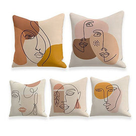 Five neutral cushion covers with abstract face line drawings over earthy colour blocks.
