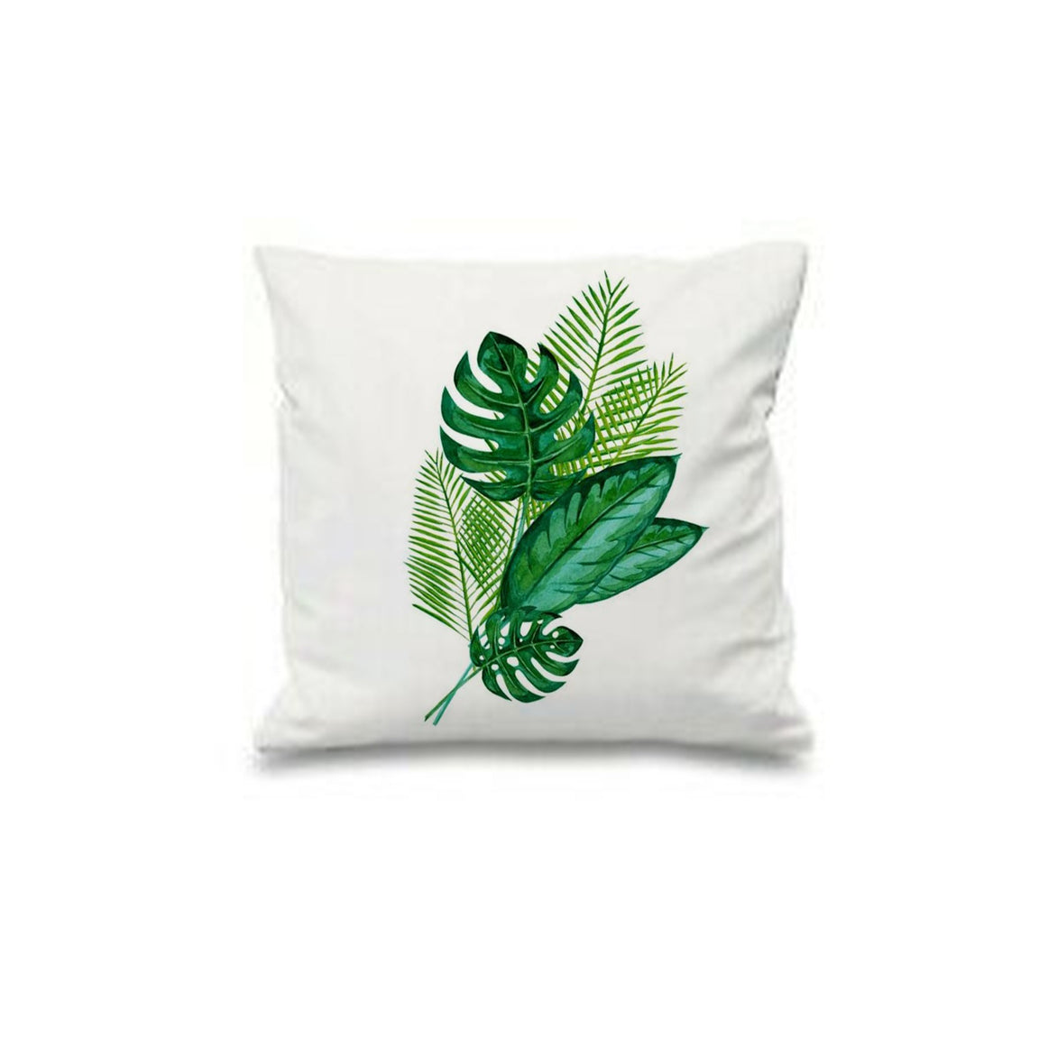 White cushion cover with overlapping green tropical leaves and pale geometric outlines.