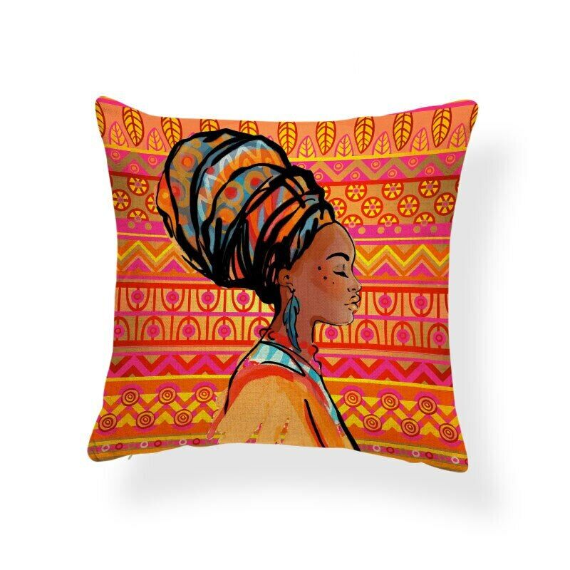 Orange patterned cushion cover with a woman wearing a colourful headwrap.