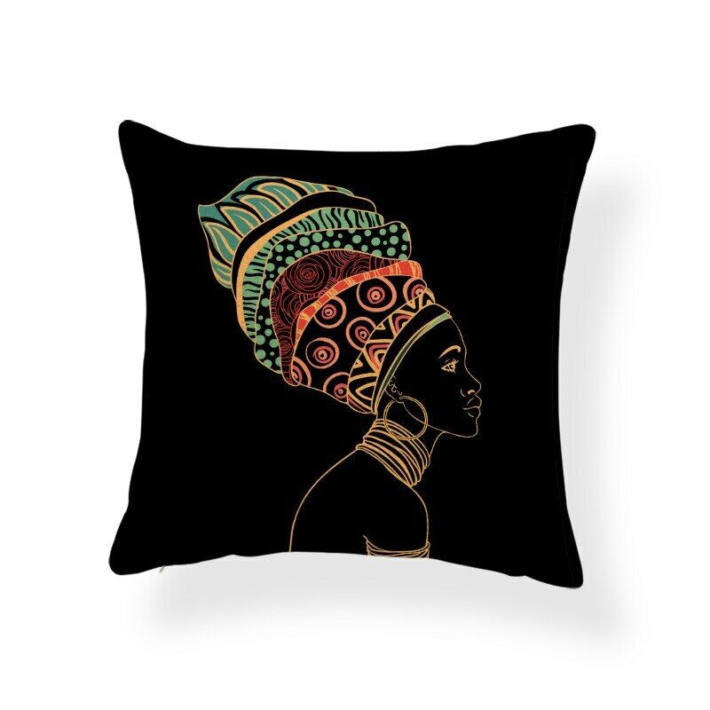 Black cushion cover with a profile illustration of a woman in a patterned headwrap.