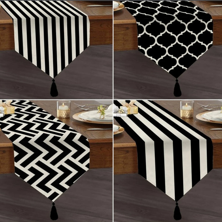 Four black-and-white striped, trellis and zigzag table-runner designs.
