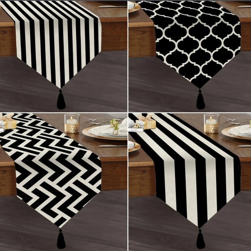 Four black-and-white striped, trellis and zigzag table-runner designs.