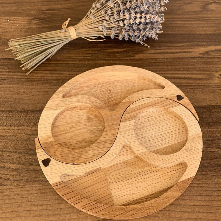 Round wood-tone tray formed by two curved sections with circular cup recesses