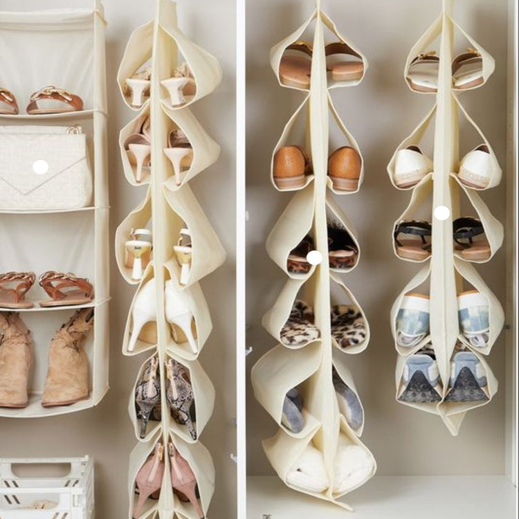 Cream hanging shoe organizers displaying shoes in individual pockets.
