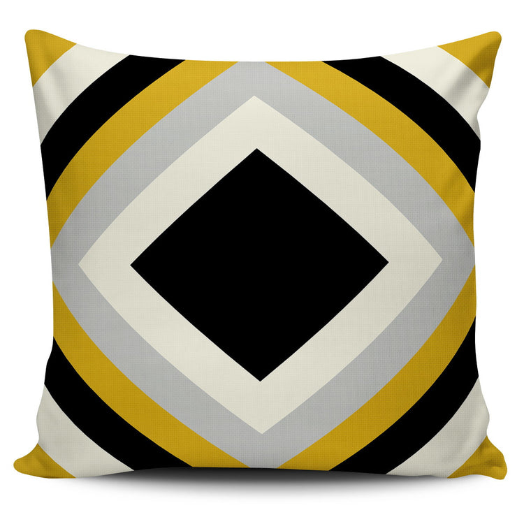 Cushion cover with nested black, cream, grey and mustard diamonds.